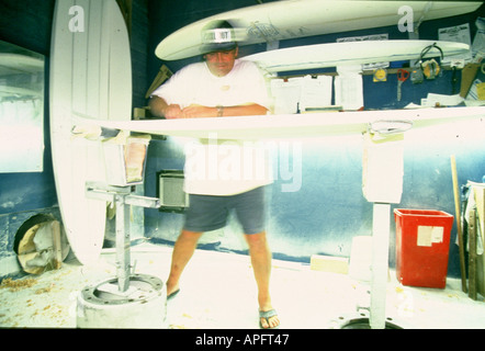 Shaping a surfboard in a workshop in Cornwall, UK Stock Photo