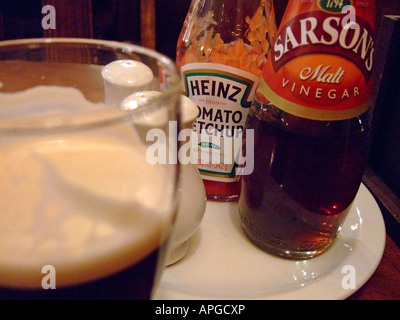 'Guinness stout salt pepper ketchup vinegar' Stock Photo