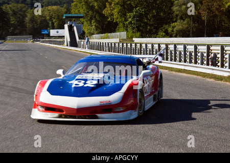 Paul Newman winning racecar driver waves checkered flag at Lime Rock Park CT Sept 29 2007 Stock Photo