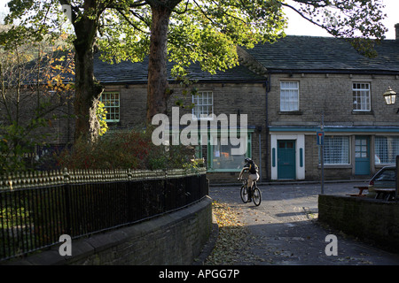 Mountain Biker Nick Craig Rides out of the Town of Hayfield and into the Peaks. Stock Photo