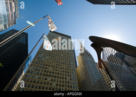 ILLINOIS Chicago Outline of untitled sculpture by Pablo Picasso in Daley Plaza blue sky top of office buildings flags waving Stock Photo