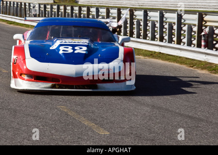 Paul Newman winning racecar driver waves checkered flag at Lime Rock Park CT Sept 29 2007 Stock Photo