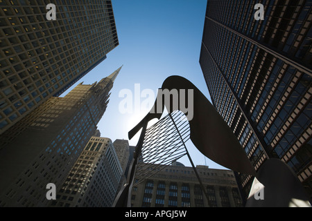 ILLINOIS Chicago Outline of untitled sculpture by Pablo Picasso in Daley Plaza blue sky top of office buildings Stock Photo