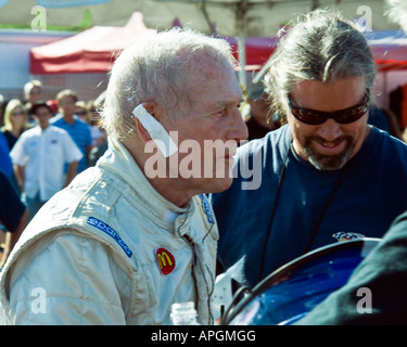 Paul Newman age 82 climbs out of racecar after winning at Lime Rock Park  CT Sept 29 2007 Stock Photo