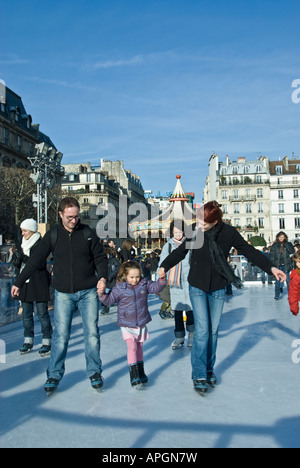 Paris France, French Families, Public Ice Skating Ring, on Town Square, skaters, winter scenes, Outdoors Stock Photo