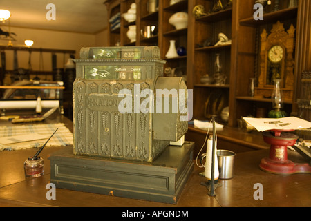 ILLINOIS Rockford Old fashioned cash register on sales counter in hardware store historic Midway Village Stock Photo