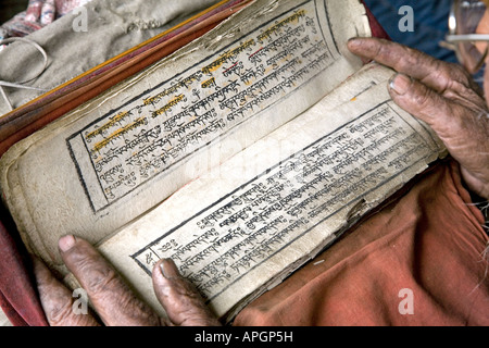 Lama Tashi reading. Praken Gompa. North of Manang. Annapurna circuit ...