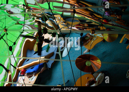mirror image of people reflecting in bizarre distorted glass ceiling South Island New Zealand Stock Photo