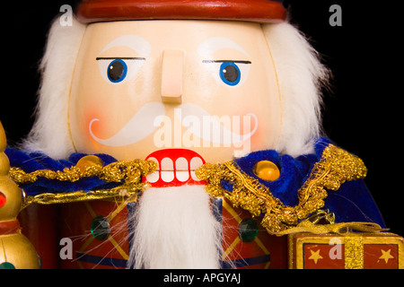 A traditional Christmas nutcracker ornament isolated on black Stock Photo