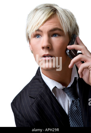 Young man talking on cellphone Stock Photo