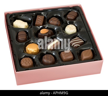 Pink box of Belgian chocolates isolated on white Stock Photo