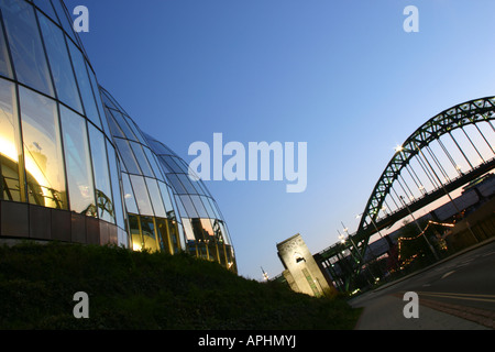 Gateshead Sage Music Centre Facade with Tyne Bridge in Background at Dusk Stock Photo