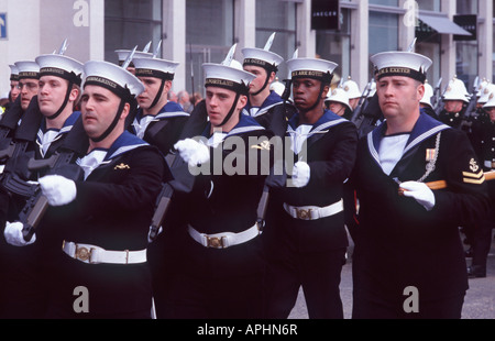 British Royal Navy officers marching with automatic weapons in the annual Lord Mayor's Show, Cheapside, City of London, England Stock Photo