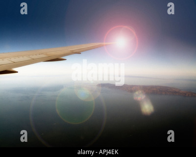 Aircraft wing on flight. Stock Photo