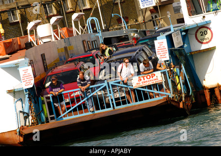 the floating bridge chain ferry taking transporting passenger and light vehicles from east to west cowes on the isle of wight Stock Photo