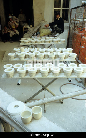 Clay moulds for forming cups in a pottery workshop, Bat Trang pottery village, Hanoi, Viet Nam Stock Photo