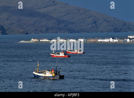 FISHING BOATS AT ANCHOR IN BAY SHELTERING FROM BAD WEATHER AT LOCH BROOM ULLAPOOL WEST COAST OF SCOTLAND UK Stock Photo