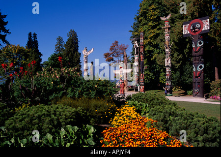 Stanley Park Totem Poles at Brockton Point, Vancouver, BC, British Columbia, Canada - Spring Stock Photo