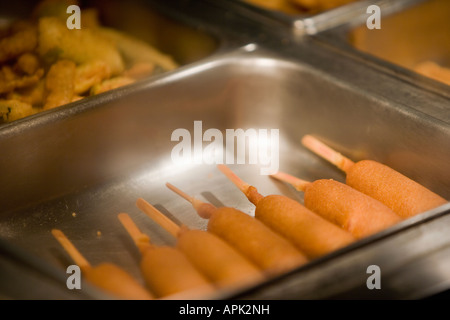 Deep fried food under a heat lamp. Stock Photo