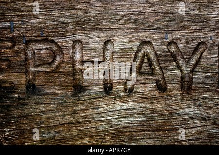 Letters Carved Into Wood Stock Photo