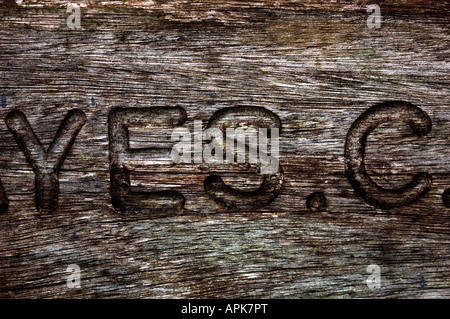 Letters Carved Into Wood Stock Photo