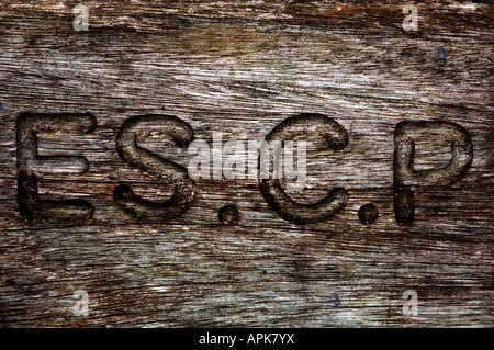 Letters Carved Into Wood Stock Photo