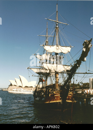 Replica of HMS Bounty Endeavour in front of Sydney Harbour Opera House Stock Photo