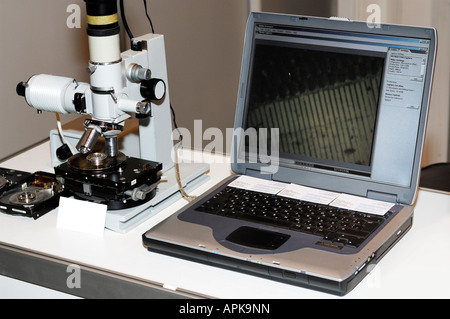 Hard disk drive under a microscope Stock Photo