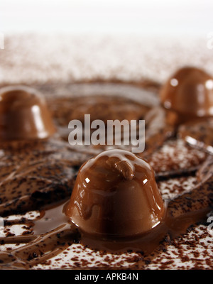 Chocolate bonanza with chunks melted chocolate and cacao Stock Photo