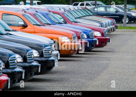 New Cars Parked In Auto Dealership Parking Lot Stock Photo