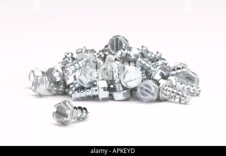 Pile Of Silver Metal Screw Bolts Stock Photo