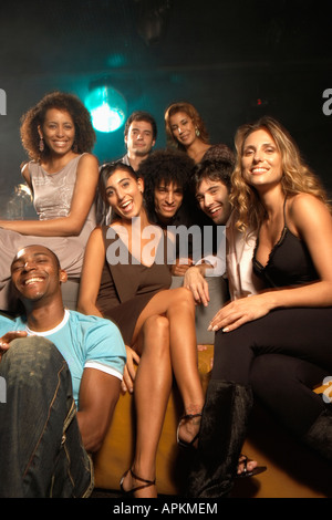 Clubbers at nightclub (portrait, low angle view) Stock Photo