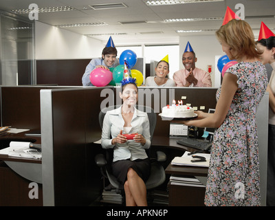 Office workers having birthday party Stock Photo