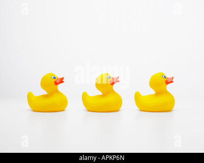 Three rubber ducks in row Stock Photo