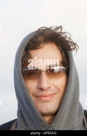 Man wearing a hooded top, sunglasses and Louis Vuitton Face Mask, at the  Black Lives Matter UK protest in Parliament Square. London, England UK  Stock Photo - Alamy