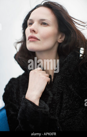Outdoor portrait of a young serious woman in autumn Stock Photo - Alamy