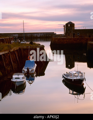 Sunrise at the old harbour. Amlwch. Anglesey. North Wales. Stock Photo