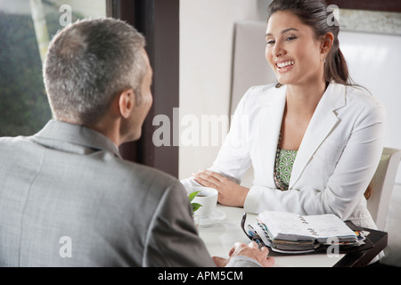 Two businesspeople meeting in café Stock Photo