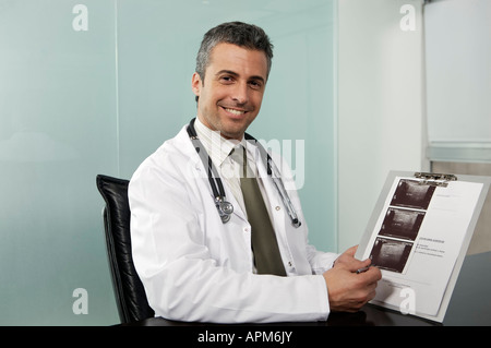 Doctor in office Stock Photo