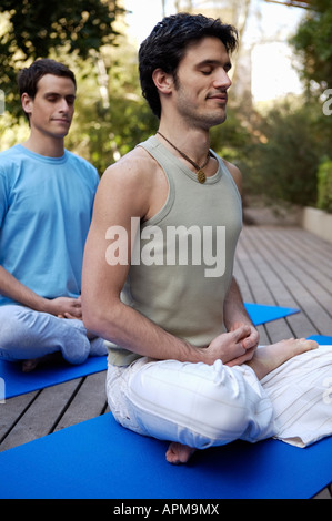 People practicing yoga Stock Photo
