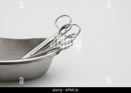 Medical scissors in kidney dish Stock Photo