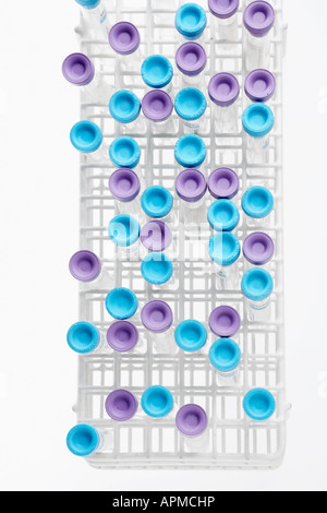 Test-tubes on color background Stock Photo - Alamy