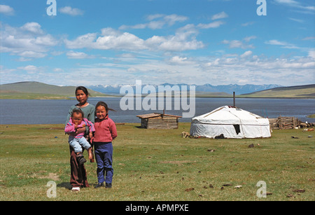 Mongolian children near yurt. Tsagaan Nuur somon. Brigade number 2. Dood Nuur Lake. Darhadyn Wetland. North Mongolia Stock Photo