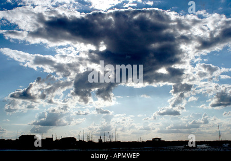 Cumulus clouds, over Bawdsey Harbour, UK Stock Photo