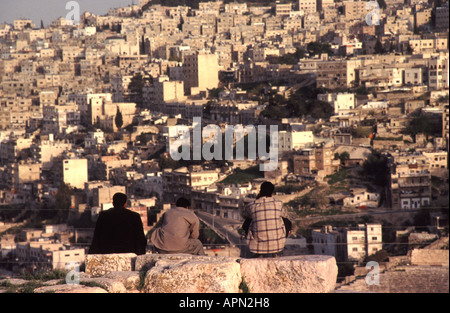 AMMAN, JORDAN. Three men looking out over Amman from Jebel al Qala. 2005. Stock Photo