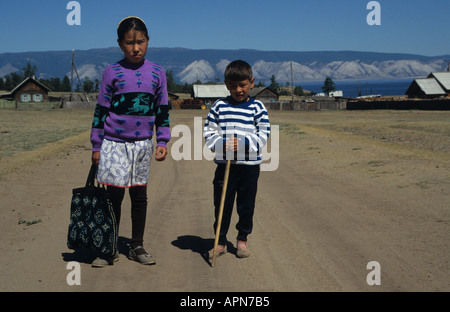 Buryat sister and brother on Olkhon island Lake Baikal Siberia Russia Stock Photo