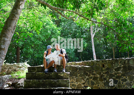 Mid adult couple hiking in old ruins
