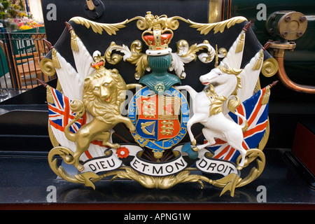 The lion and unicorn coat of arms on the royal train at Windsor station Stock Photo