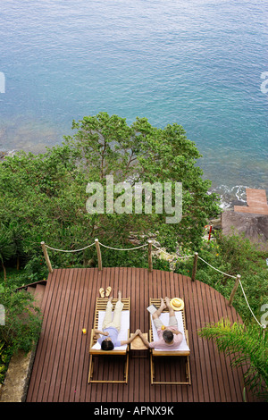 High angle view of mature couple lying on bed at home Stock Photo - Alamy