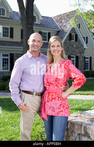 Mature couple near house, Chatham, New Jersey, USA Stock Photo